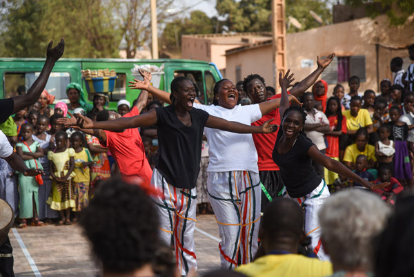 Dancers celebrating with the audience.